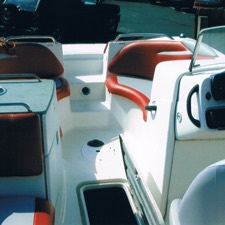 Boat interior with new orange and white marine upholstery